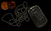 dog tags and two pennies